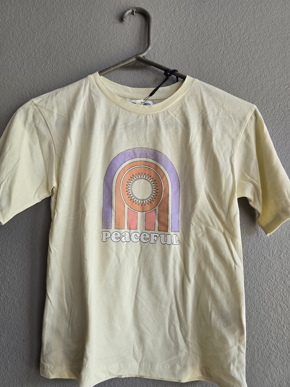 Hundred Pieces Yellow Kids Tee with Purple and Orange Graphic